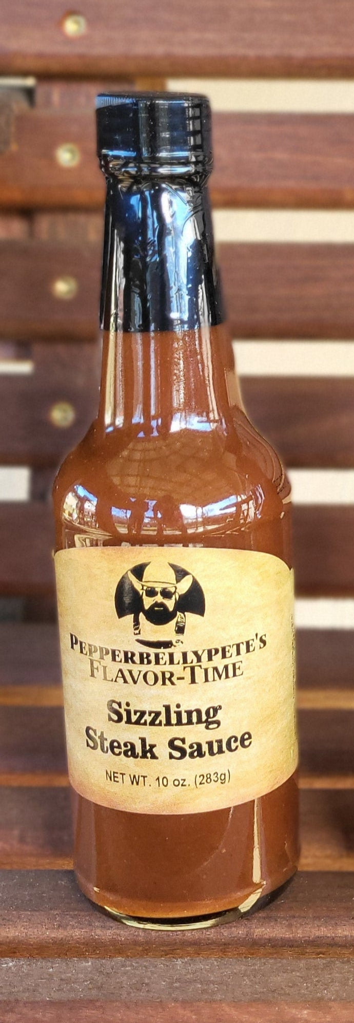 Bottle of Pepper Belly Pete's Steak & Burger Sauce - bold grilling flavor from Texas front